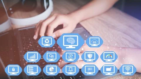 A woman using a laptop computer Stock Photos