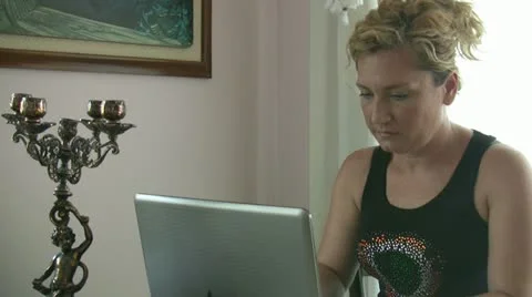 Woman using laptop Stock Footage 11710679