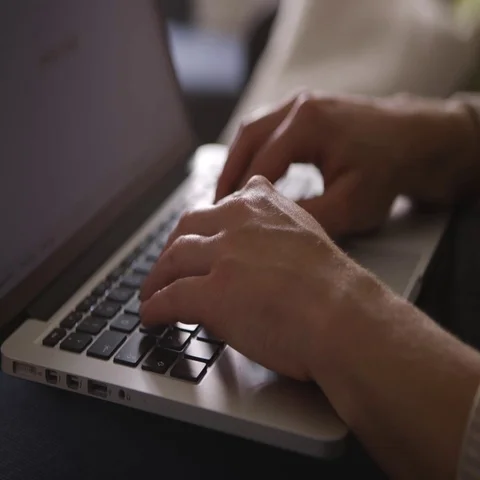 Woman using a laptop Stock Footage 69493997