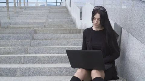 Woman using a laptop Stock Footage 76467450