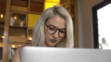Woman using laptop Stock Footage 85777450