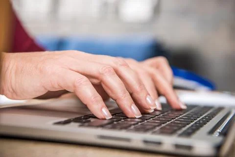 Woman using laptop Stock Photos