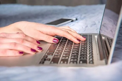 Woman using laptop Stock Photos