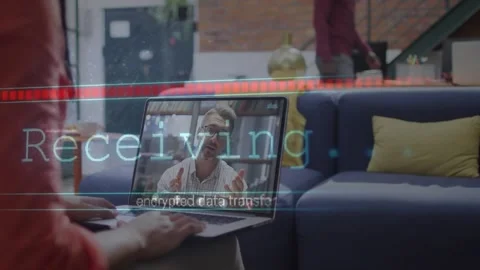 Woman using laptop on tech call host starting encrypted transfer overlay showing Stock Footage 334182489
