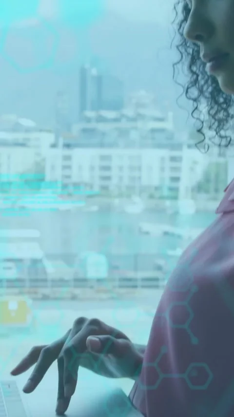 Woman using laptop by window with digital network animation overlay Stock-Footage 344285292