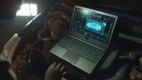 Woman Using Laptop At Work In Car Repair Shop Stock Footage 244832275