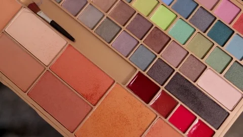 Woman using make up Stock Footage 75218393