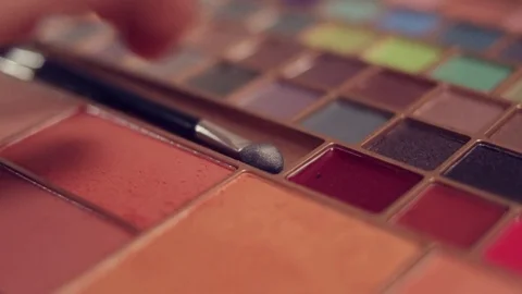 Woman using make up Stock Footage 75219052