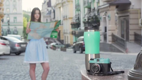 Woman using a map in the city while travelling Stock Footage 115340310