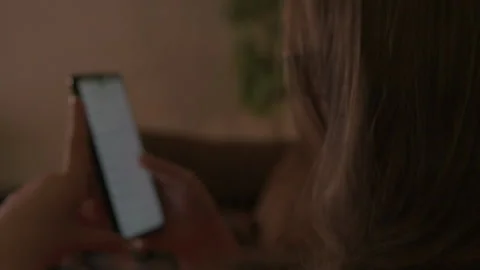 Woman Using Mobile App to Order Food At Home Slow Motion Stock Footage 144757915