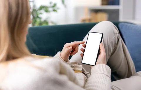 Woman using mobile with blank screen Stock Photos