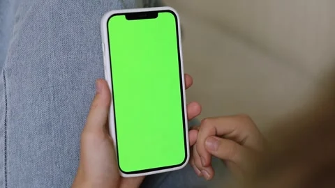 Woman using mobile phone blank green screen Stock Footage 246443337