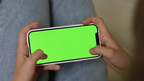 Woman using mobile phone blank green screen Stock Footage 246443364