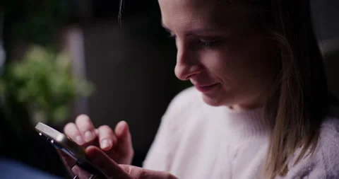 Woman Using Mobile Phone Browsing Social Media Video stock 229039980