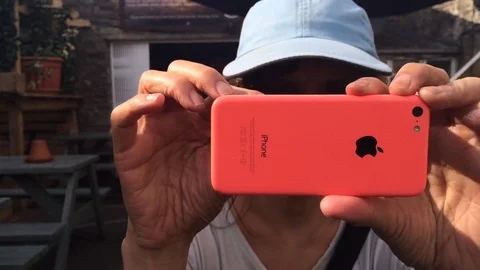 Woman using mobile phone as camera. Video stock 80098397