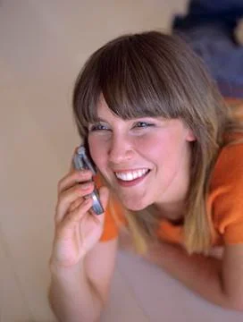 Woman using mobile phone, elevated view Stock Photos