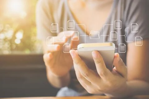Woman using mobile smartphone. Document management system (DMS), online docum 스톡 사진