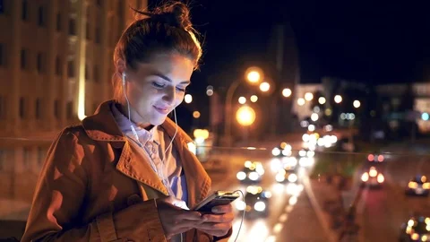 Woman using mobilephone in city  Video stock 80679761