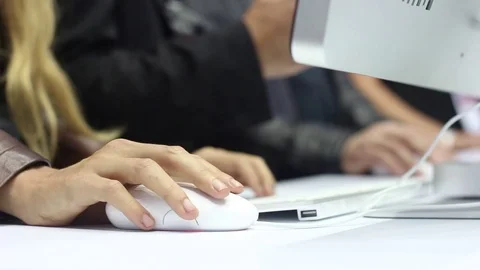 Woman using a modern white computer mouse Stock Footage 72026300