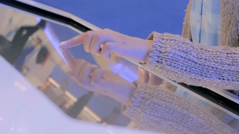 Woman using multimedia touchscreen display of interactive kiosk Stock Footage 109632855