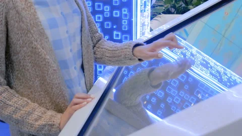 Woman using multimedia touchscreen display of interactive kiosk Stock Footage 111873420