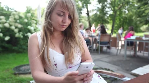 Woman using a phone Video stock 67168775