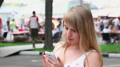 Woman using a phone Video stock 67169203