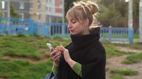 Woman using a phone Video stock 67831793
