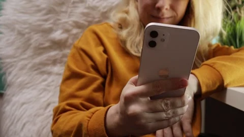 Woman using phone iphone 12 for business, remote work, payment transaction,.. Stock Footage 252021653