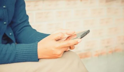 Woman using phone Stock Photos