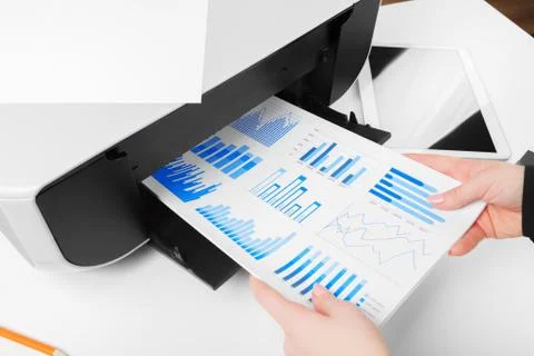 Woman using the printer to scanning and printing document Stock Photos