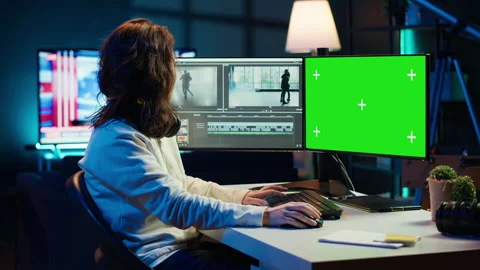 Woman using professional software on mockup PC to create visual effects Stock Footage 283595317