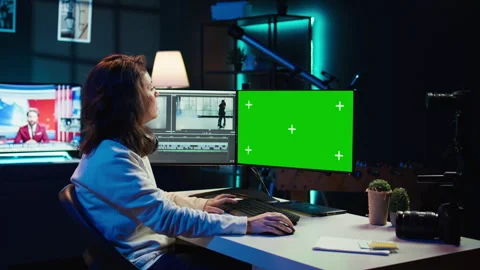 Woman using professional software on mockup PC to create visual effects Stock Footage 283691074