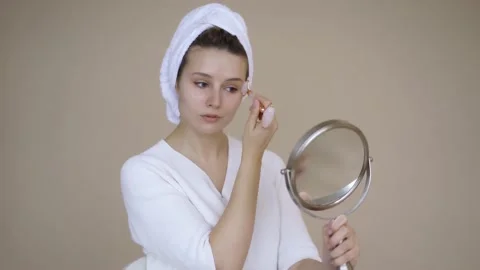 Woman Using Quartz Roll On. Beautiful Woman Using Jade Roller. Facial treatment Stock Footage 142201247