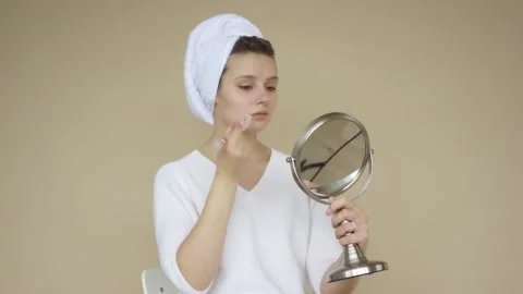 Woman Using Quartz Roll On. Beautiful Woman Using Jade Roller. Facial treatment Stock Footage 142201432