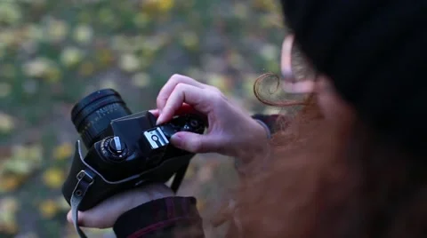 Woman using a Retro Camera Stock Footage 56377699