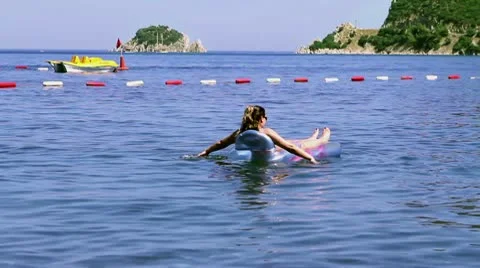 Woman Using Sea Bed Stock Footage 10586256