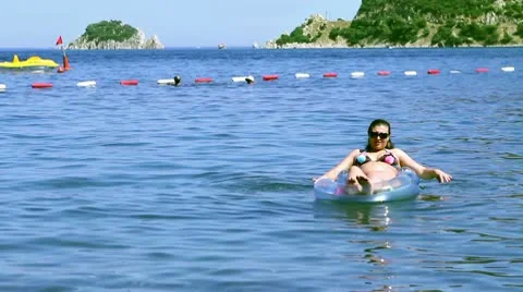 Woman Using Sea Bed Stock Footage 10586322