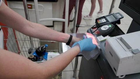 Woman using self service checkout in a store. Stock Footage 134629655