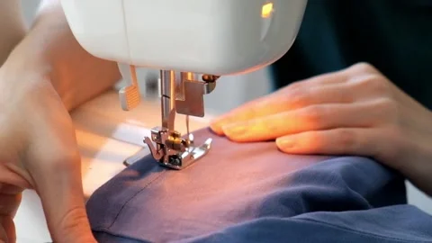 Woman using sewing machine Close up Stock Footage 88905568