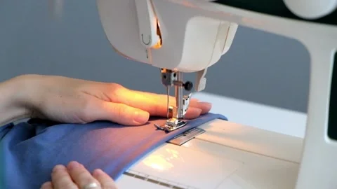 Woman using sewing machine Close up Stock Footage 88906055