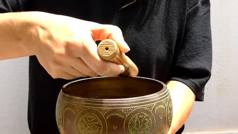 Woman using Singing Bowl Stock Footage 114755853
