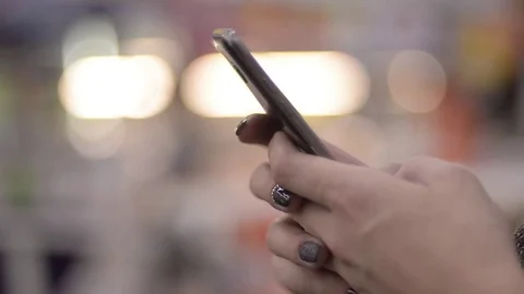 Woman Using Smart Phone In Crowded Place Stock Footage 83620945