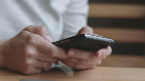 Woman using smart phone Stock Footage 68945385