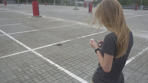 Woman using smart-phone Stock Footage 76645997