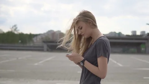 Woman using smart-phone Stock Footage 76646879