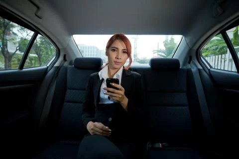 Woman using a smart phone Stock Photos