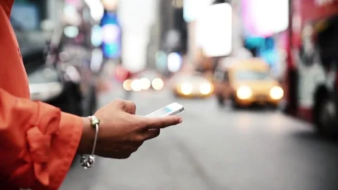 Woman using smart phone in Time square Video stock 73475846