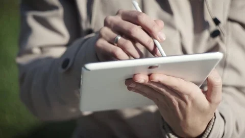 Woman Using Smart Tablet Stock Footage 73887098