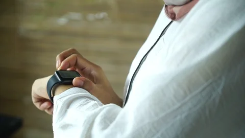 Woman using smart watch Stock Footage 128821081